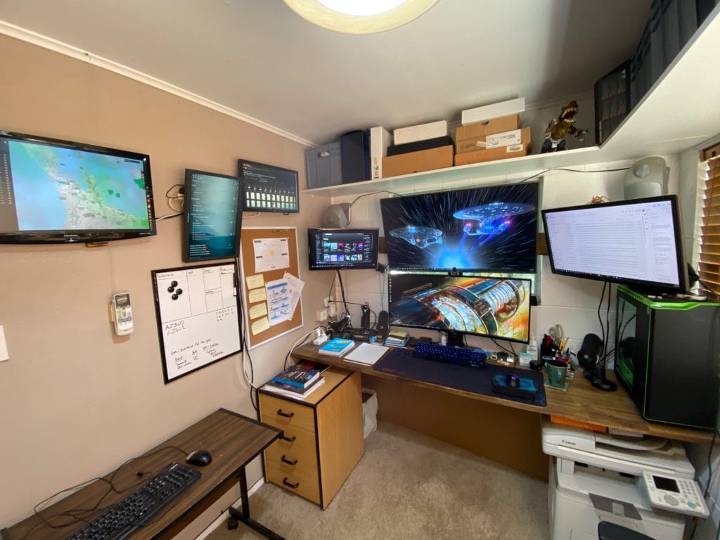 Home office with multiple monitors